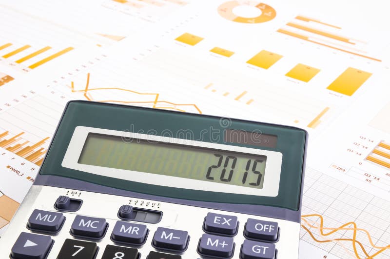 Graphs background with 2015 number on calculator stock images Graphs background with 2015 number on calculator stock images