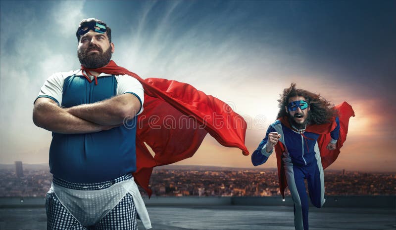 Grappig portret van twee super helden stock foto Grappig portret van twee super helden stock foto