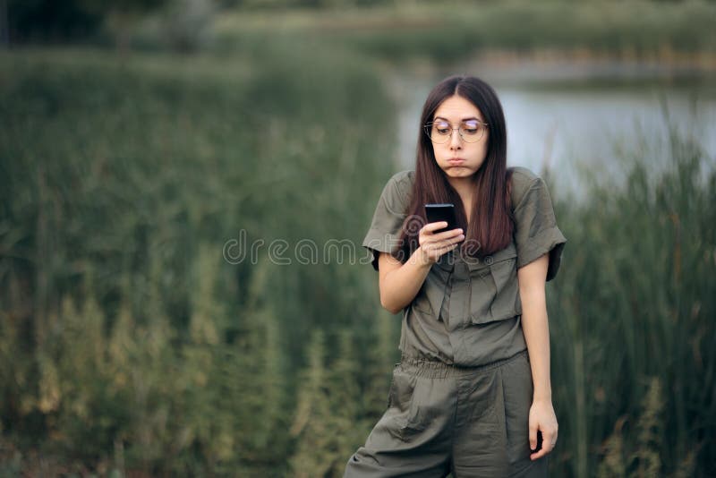 Disoriented girl trying to find a specific location in the wild. Disoriented girl trying to find a specific location in the wild