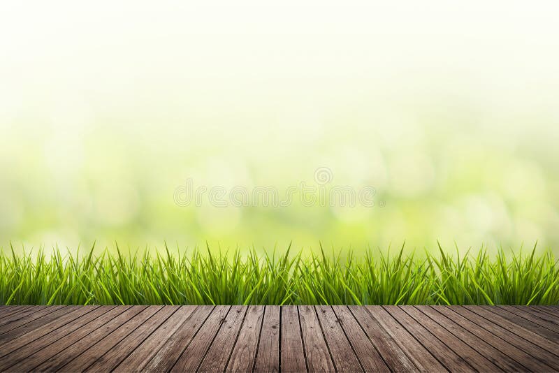 Fresco primavera césped naturaleza verde borroso a madera piso.