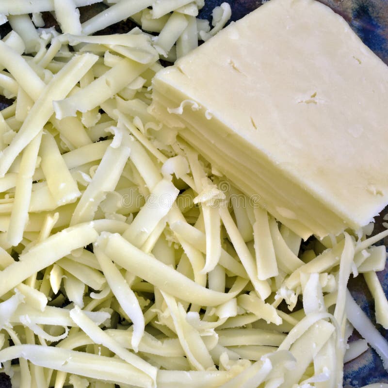 Grated cheddar cheese stock image. Image of hard, wood 14385089
