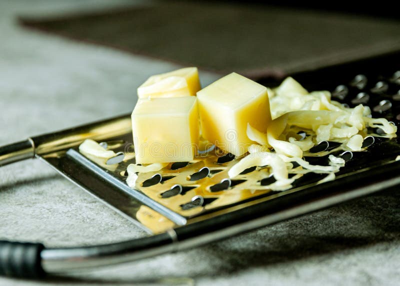 Grated Parmesan Cheese, Cheese Grater with Cheddar Stock Photo Image