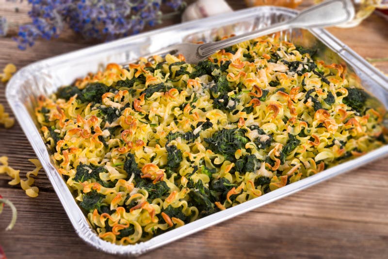 A tasty Spinach noodle crowd au gratin. A tasty Spinach noodle crowd au gratin