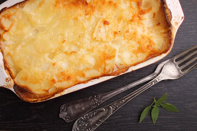 Gratin potatoes with milk stock photo. Image of heat 60298172