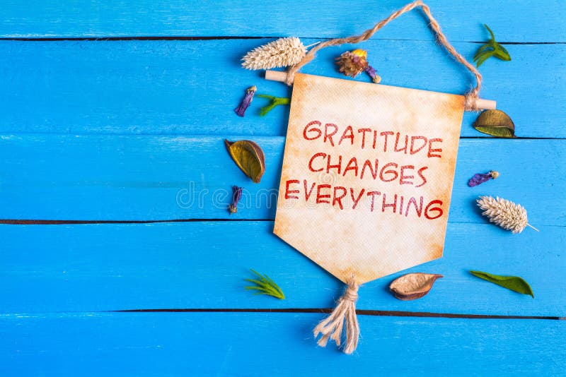 Gratitude changes everything text on Paper Scroll stock image