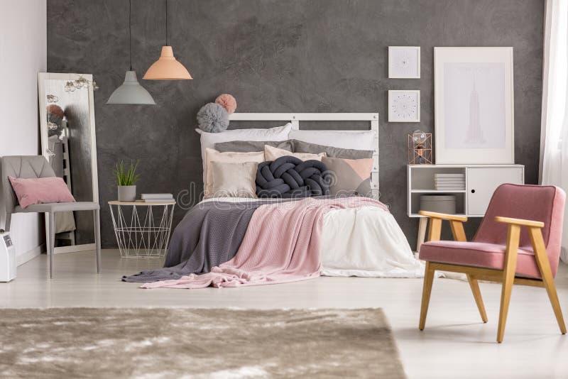 Cozy, gray and pastel pink teenage girl bedroom interior with retro furniture. Cozy, gray and pastel pink teenage girl bedroom interior with retro furniture