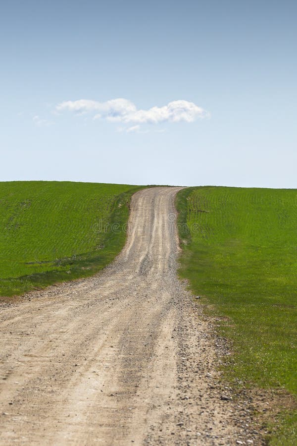 Gravel road to the hill stock photo. Image of gravel 233972138