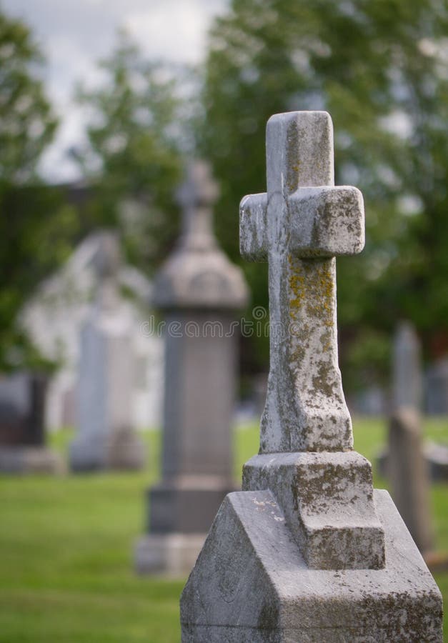 Graveyard Headstone with crucifix.