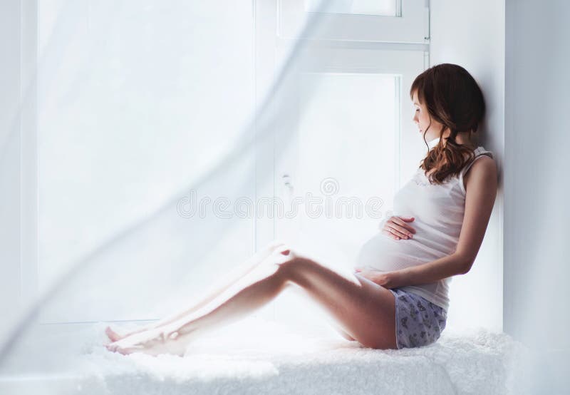 gravid kvinna royaltyfria bilder gravid kvinna royaltyfria bilder