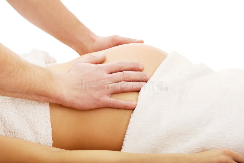 Gravid kvinna som har en avslappnande massage royaltyfri fotografi Gravid kvinna som har en avslappnande massage royaltyfri fotografi