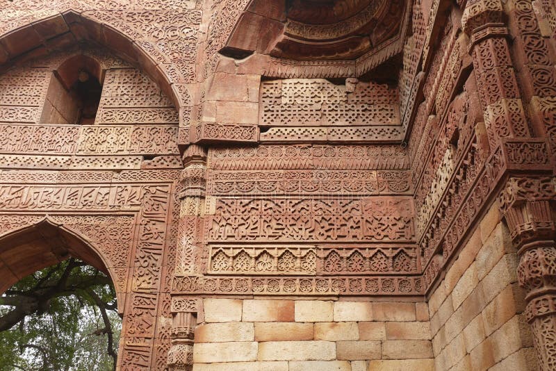 Elaborate carvings at ruins of the Tomb of slave dynasty sultan Iltutmish from 13th century, Qutb Minar complex, Delhi, India. Elaborate carvings at ruins of the Tomb of slave dynasty sultan Iltutmish from 13th century, Qutb Minar complex, Delhi, India