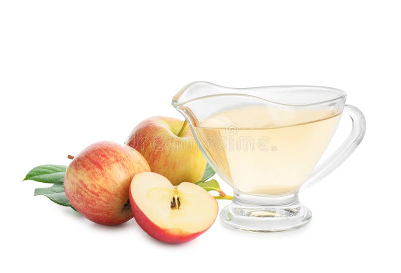 Gravy Boat of Apple Cider Vinegar on White Background Stock Photo