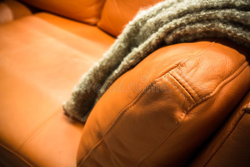 Gray Blanket Draped Over a Leather Couch Stock Photo Image of