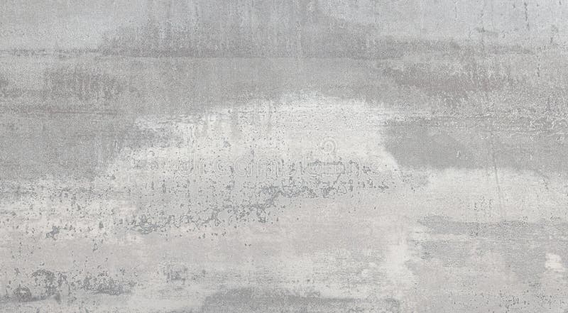 Gray concrete background showing a textured surface with brushstrokes stock photo