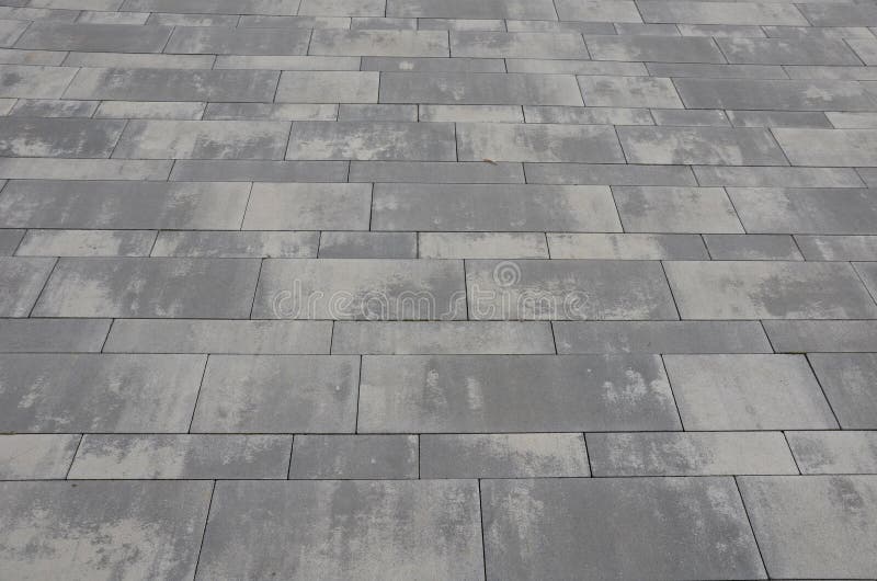 Gray Concrete Paving Gray with Stains in the Appearance of Old Stone, or Fired Paving in Several