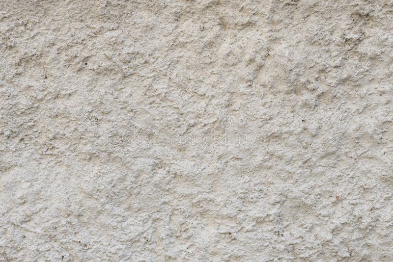 Gray concrete wall with interesting plaster royalty free stock image
