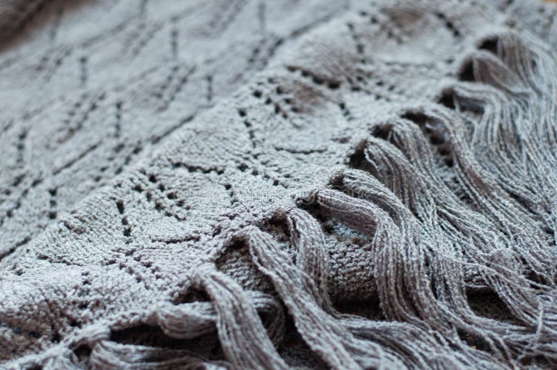 Gray detail of woven handicraft knit shawl