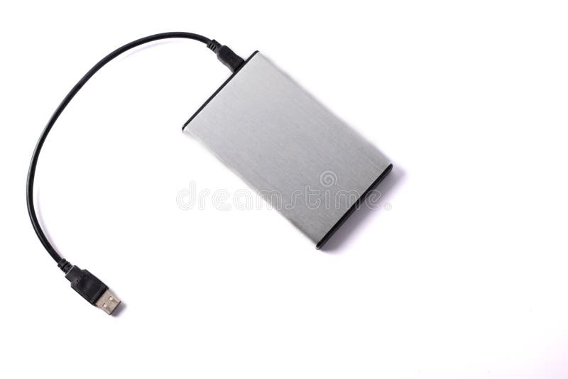 Gray External Hard Disk with Black USB Cable on White Background Stock