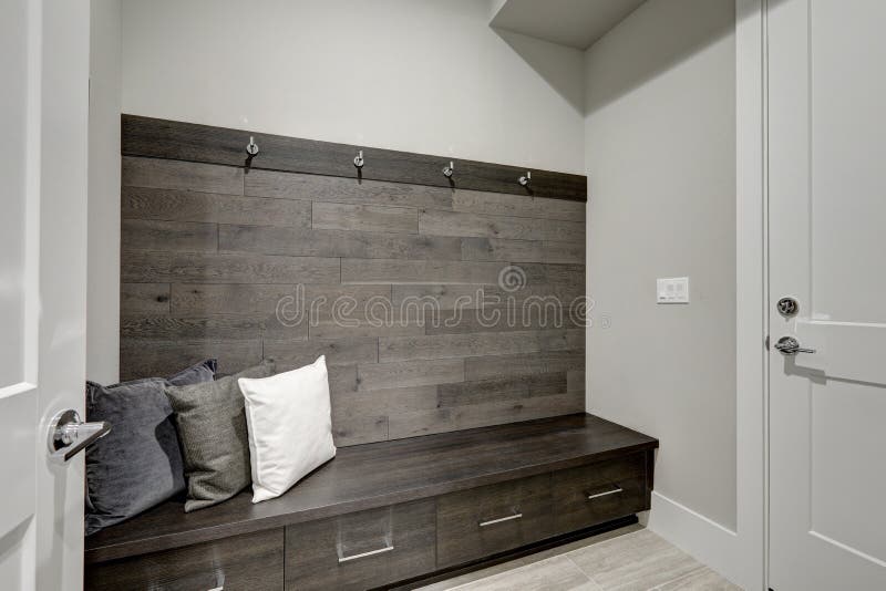 Gray Foyer Features Half Wood Plank Accent Wall Stock ...