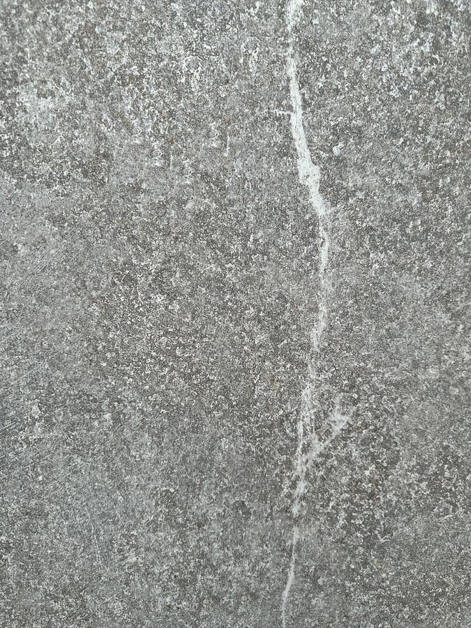 Gray granular textured surface royalty free stock image