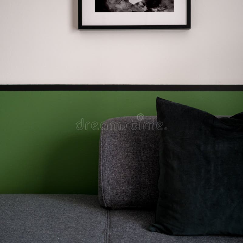 Gray sofa and green wall stock image. Image of design 196445219