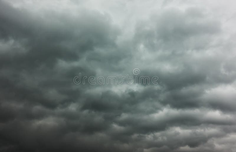 Gray stormy sky with lots of heavy clouds royalty free stock images