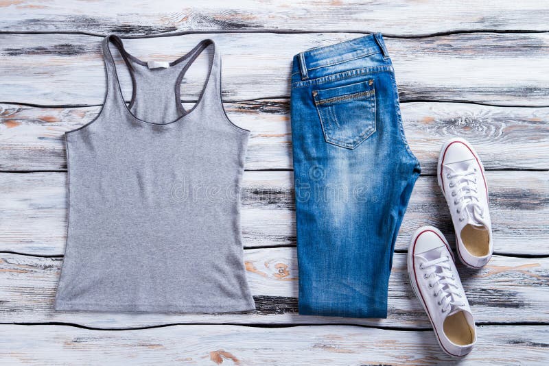 Gray tank top and jeans. stock photo. Image of jeans - 71845524
