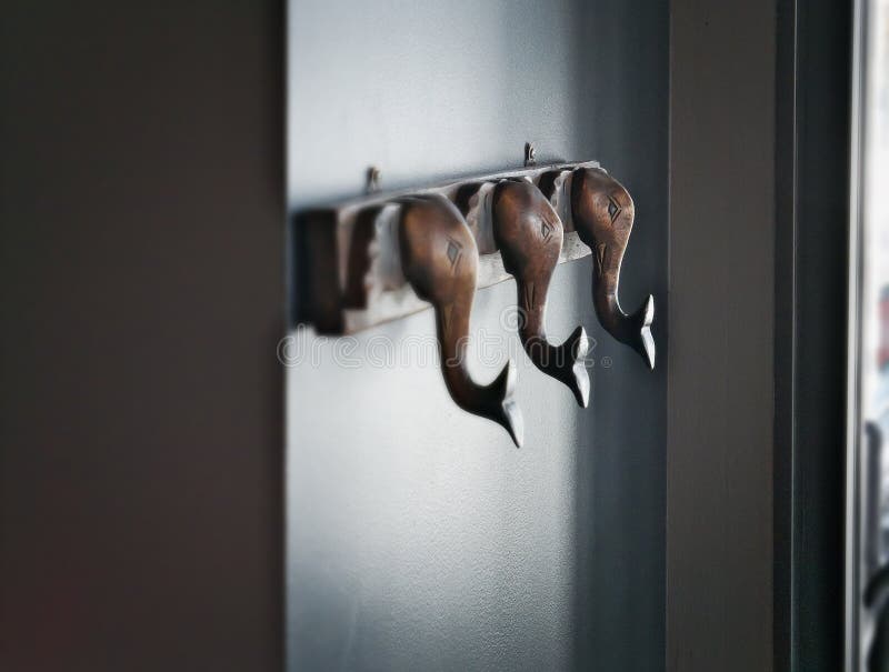 Gray Walls with Coat Hooks that are Backlit Stock Photo Image of