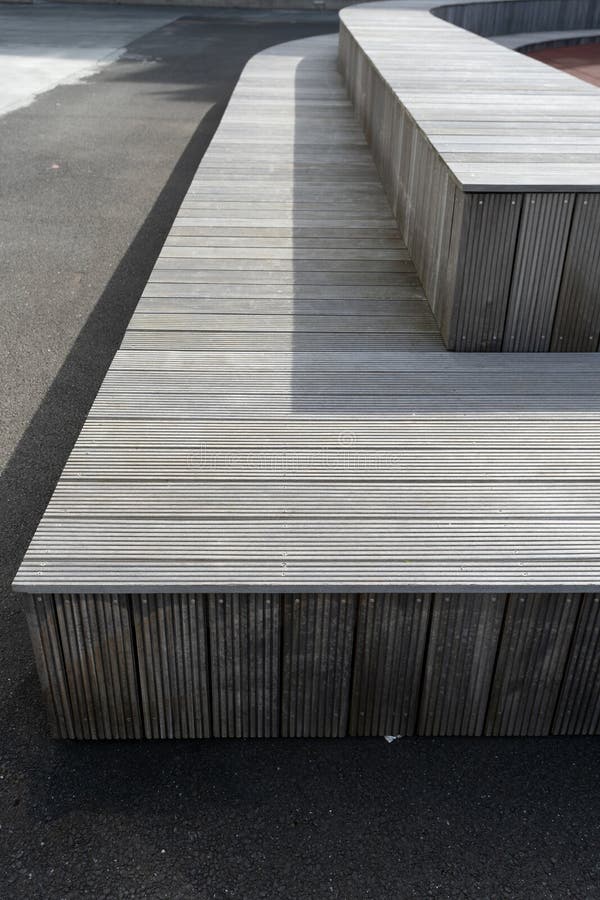 Gray wooden bench in the city yard street royalty free stock image Gray wooden bench in the city yard street royalty free stock image