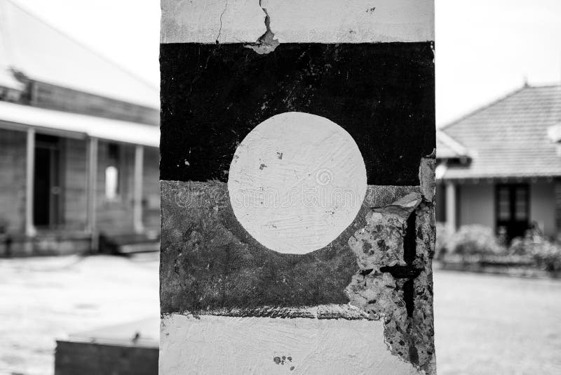 A grayscale shot of the old column with a painted circle. Retro grayscale paint stock images, royalty-free photos and pictures