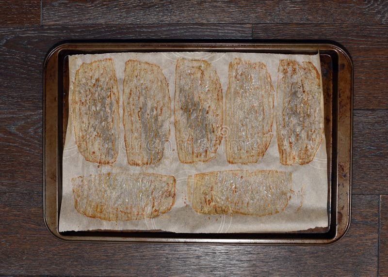 Grease on baking sheet stock photo. Image of aged, greasy 146975006