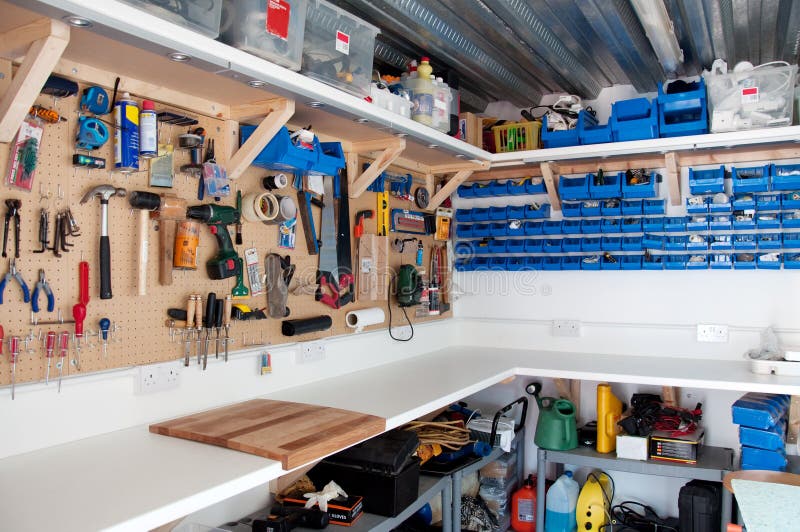 Workshop area in a home garage with organisation of tools and DIY equipment