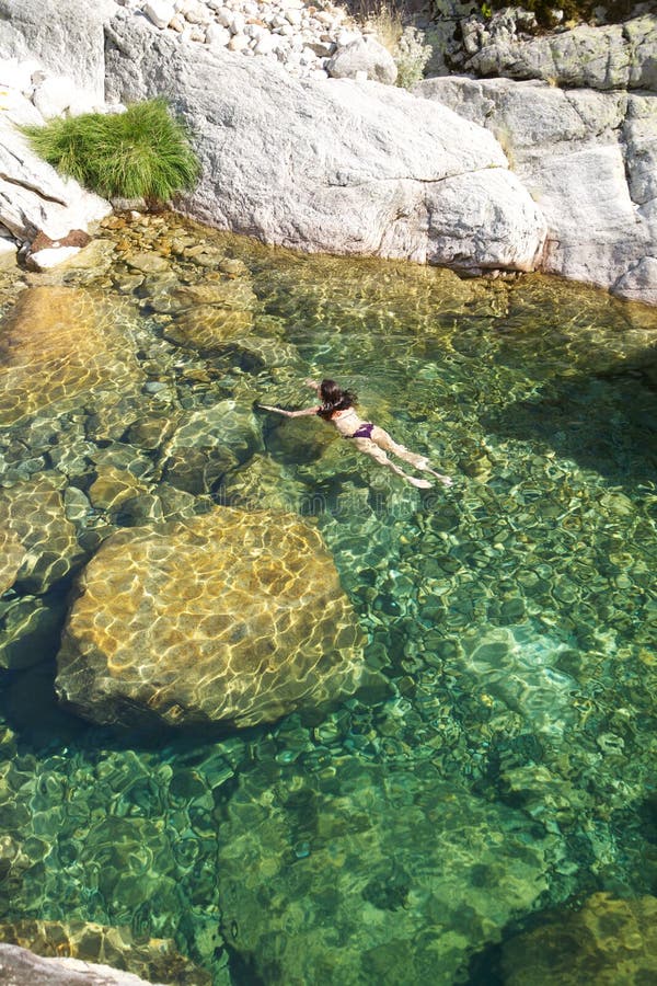 Great natural pool with woman