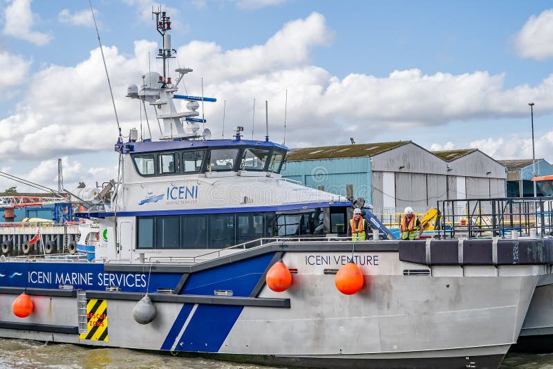 Great Yarmouth, Norfolk, UK – September 08 2019. The Iceni Venture crew transfer vessel sailing down the River Yare in the town of Great Yarmouth. Great Yarmouth, Norfolk, UK – September 08 2019. The Iceni Venture crew transfer vessel sailing down the River Yare in the town of Great Yarmouth