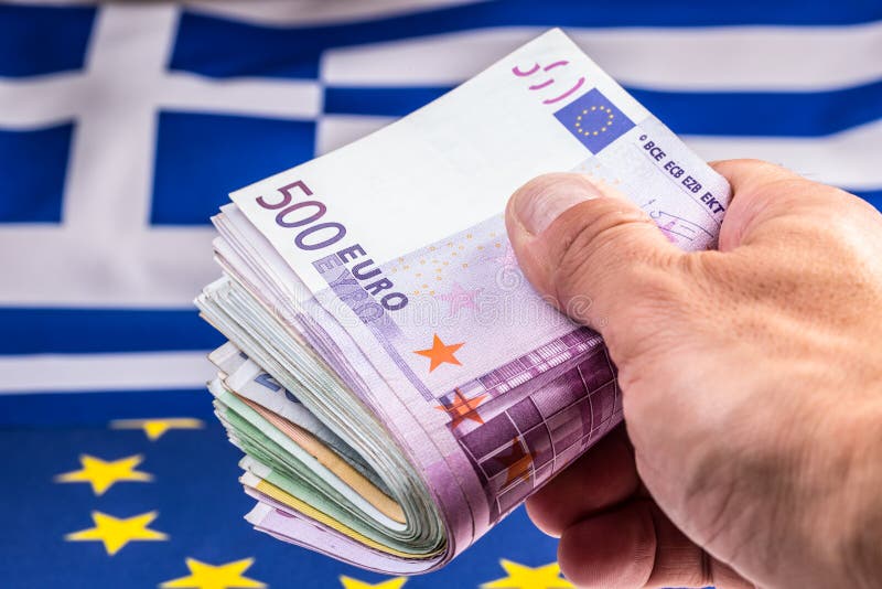 Greece and european flag and euro money. Coins and banknotes European currency freely lai