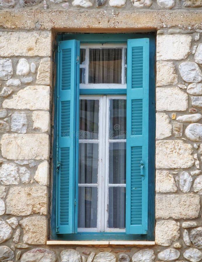 Greece, wooden green window of traditional stone house royalty free stock images Greece, wooden green window of traditional stone house royalty free stock images