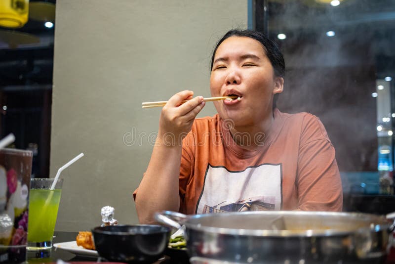 Asian Girl Smoking Blunt With Chopsticks