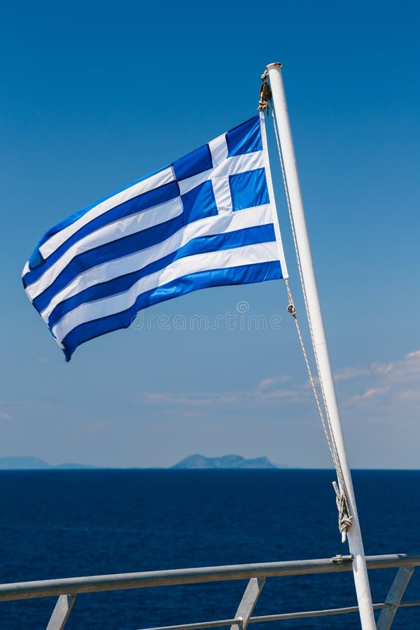 Premium Photo  Greek flag on boat cruise around the island of