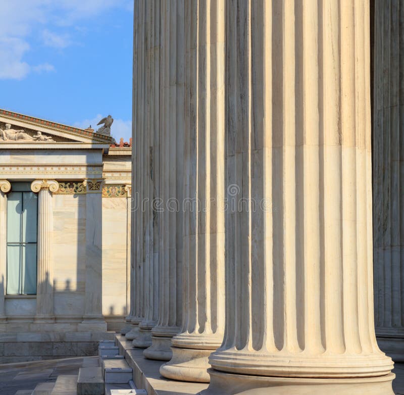 Greek Marble Pillars Infront of a Classical Building Stock Image