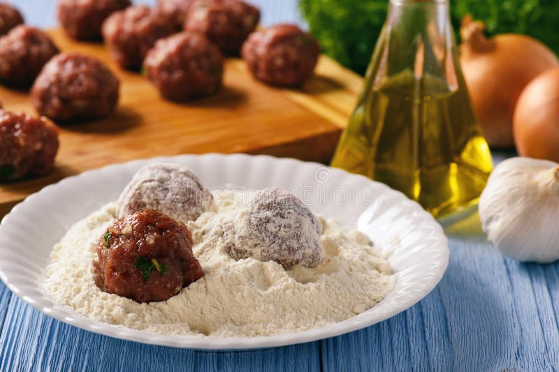 Greek meatballs keftedes -cooking process.