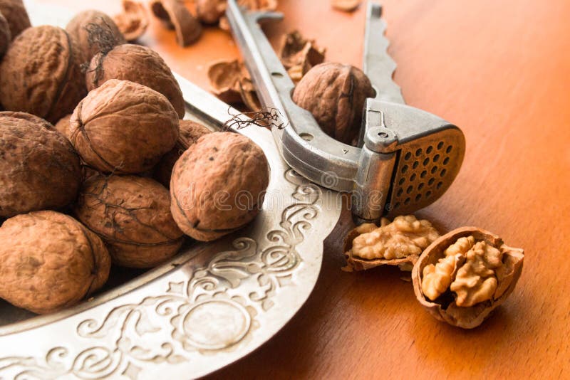 Brown Greek Nut With Nutcracker Stock Photo Image of fruit, pressure