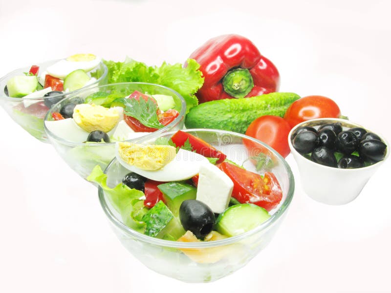 Greek salad in bowls stock image. Image of color, leaf 16635077