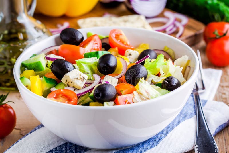 Greek salad of organic tomatoes, cucumber, red onion, olives and feta cheese