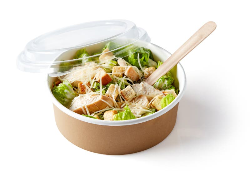 Greek salad in take away bowl on white background