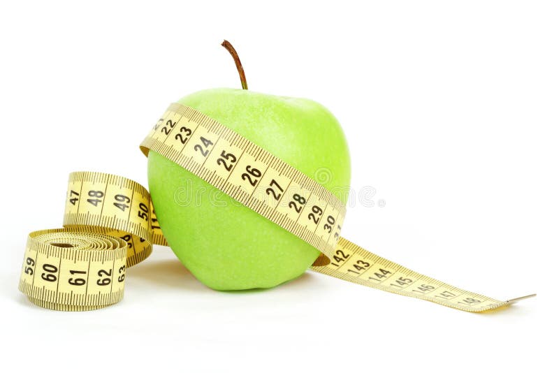 Green apple and measuring tape isolated on white background