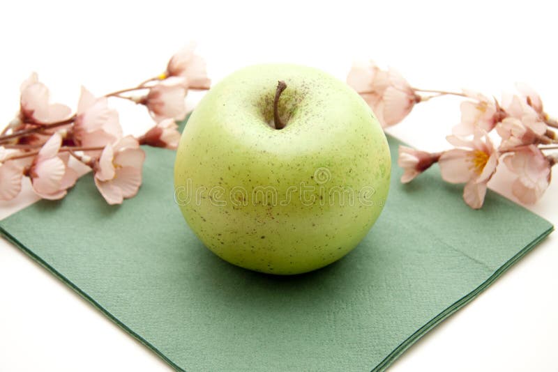 Green apple with napkin