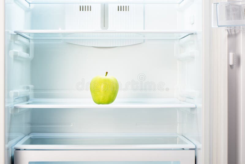 Green Apple on Shelf of Open Empty Refrigerator Stock Image Image of