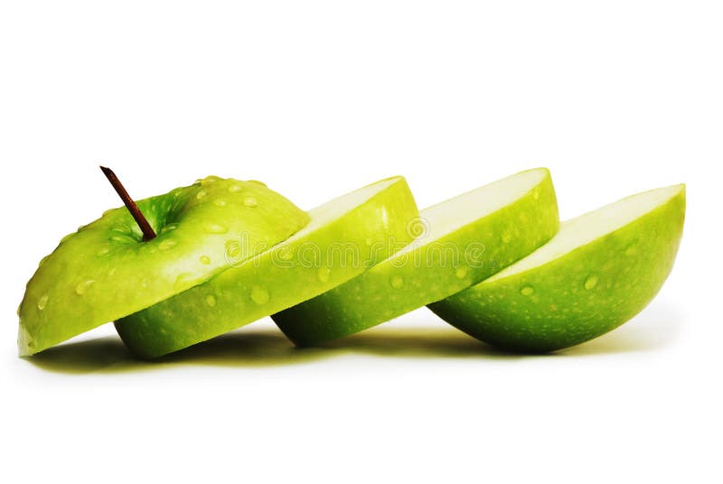 Green apple in slices isolated on white