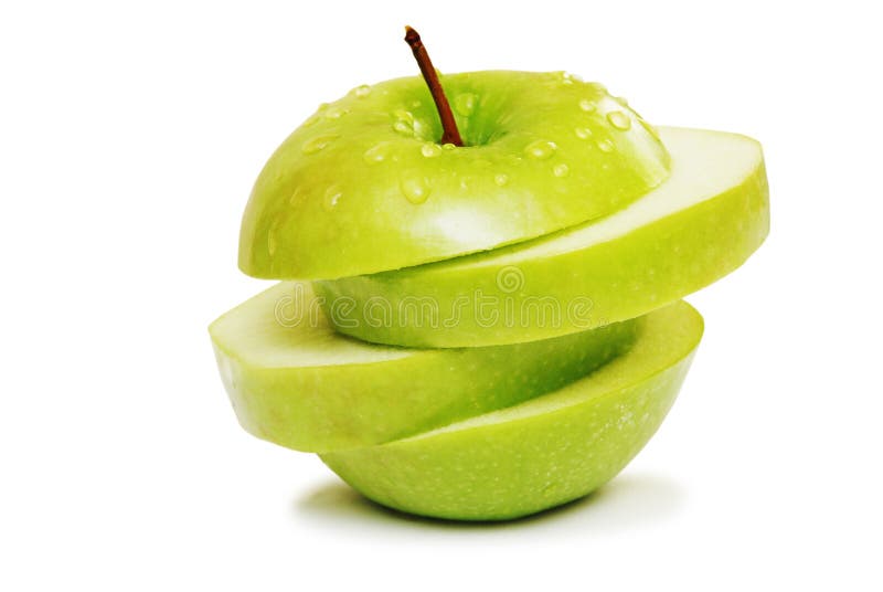 Green apple in slices isolated on white