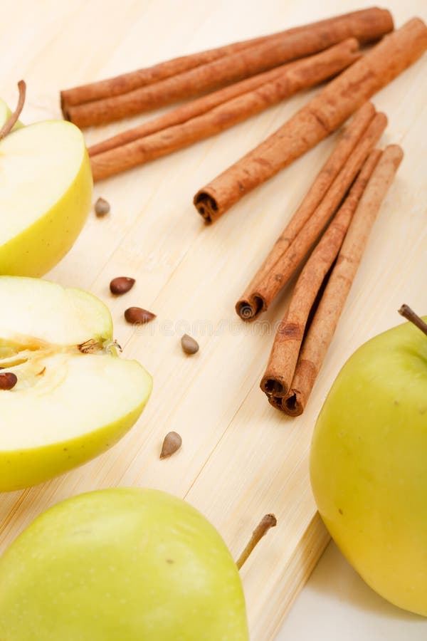 Green apples and cinnamon stock photo. Image of ripe 13362486